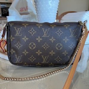 Authentic Louise Vuitton pouchette.
